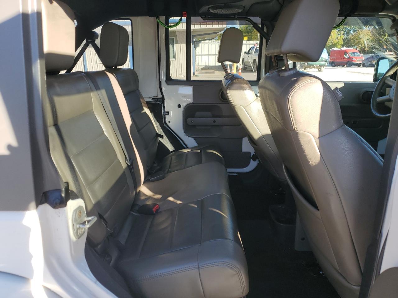 2010 Jeep Wrangler Unlimited Sahara VIN: 1J4HA5H11AL166936 Lot: 82309995