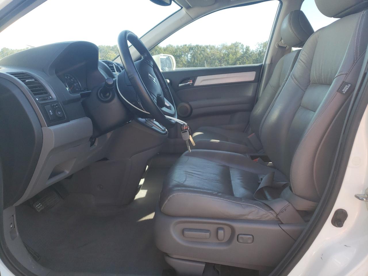 2010 Honda Cr-V Exl VIN: JHLRE4H77AC015566 Lot: 85587385