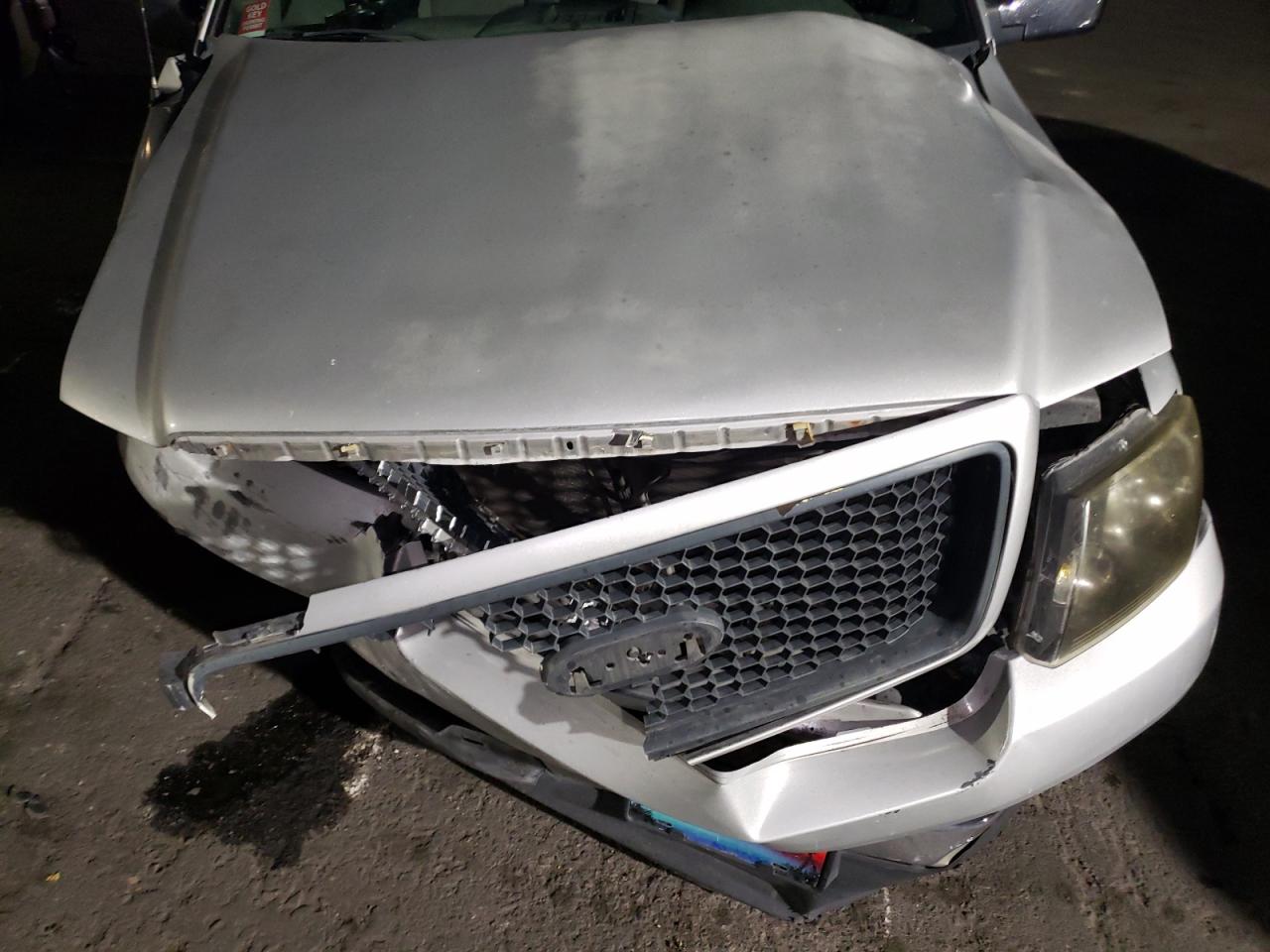 2005 Ford F150 VIN: 1FTRF02255KC23912 Lot: 90409025