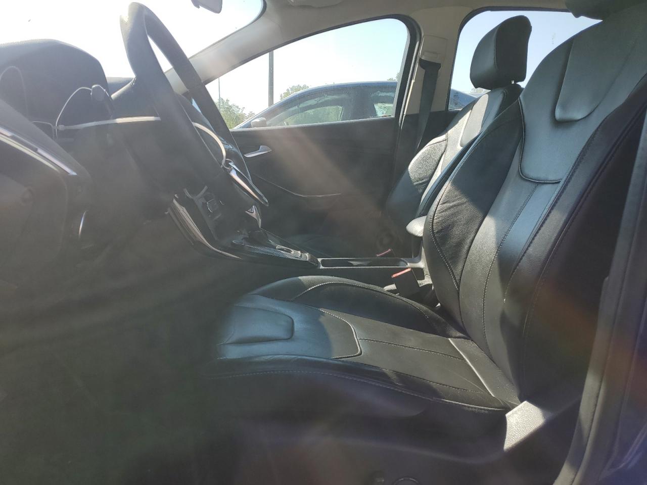 2015 Ford Focus Titanium VIN: 1FADP3J21FL363273 Lot: 85180025