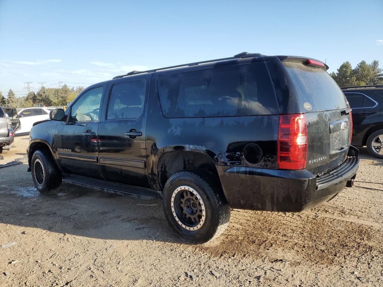 2011 Chevrolet Suburban C1500 Ls VIN: 1GNSCHE04BR199387 Lot: 85268875