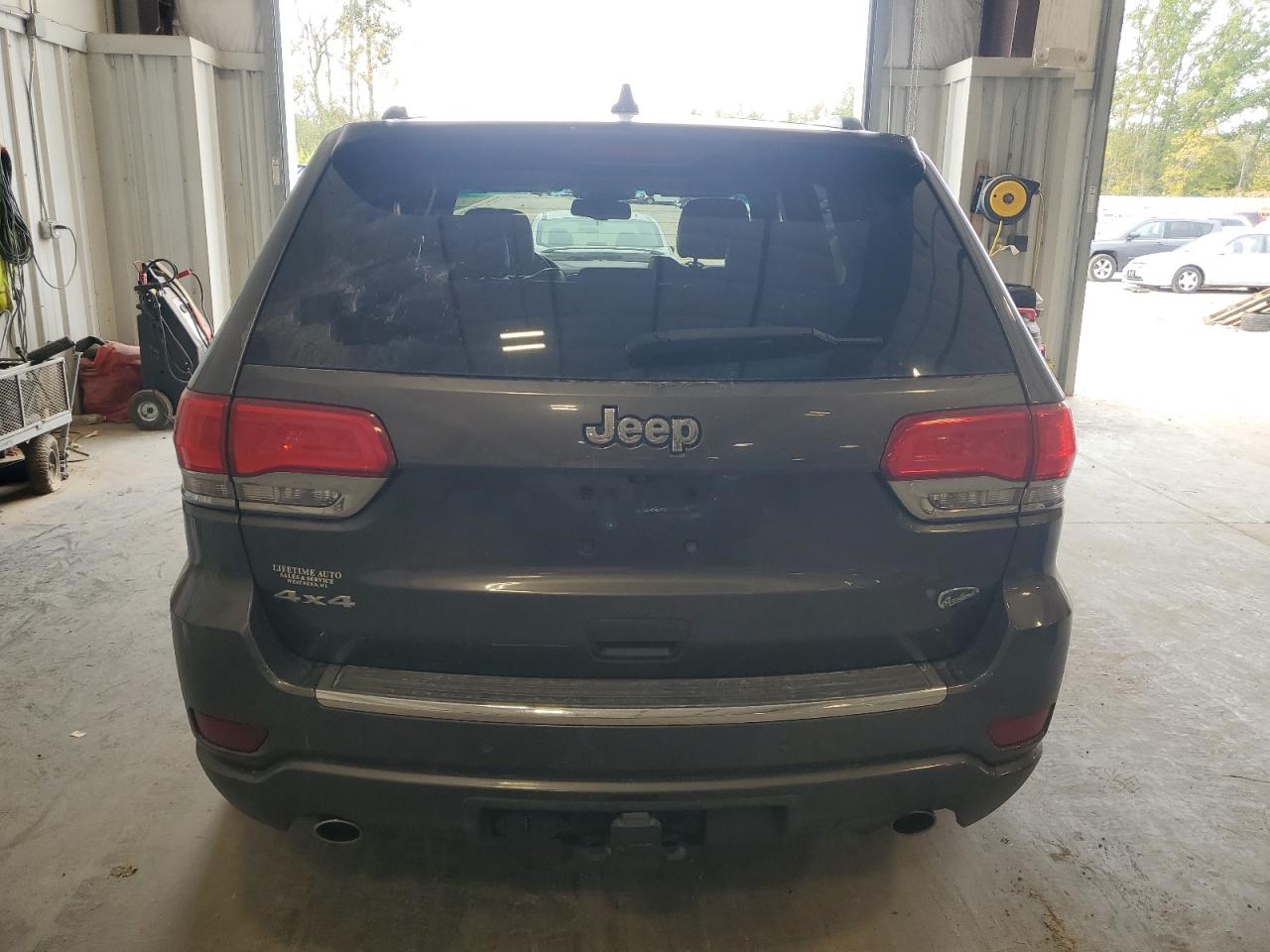 2015 Jeep Grand Cherokee Overland VIN: 1C4RJFCGXFC877599 Lot: 82388315
