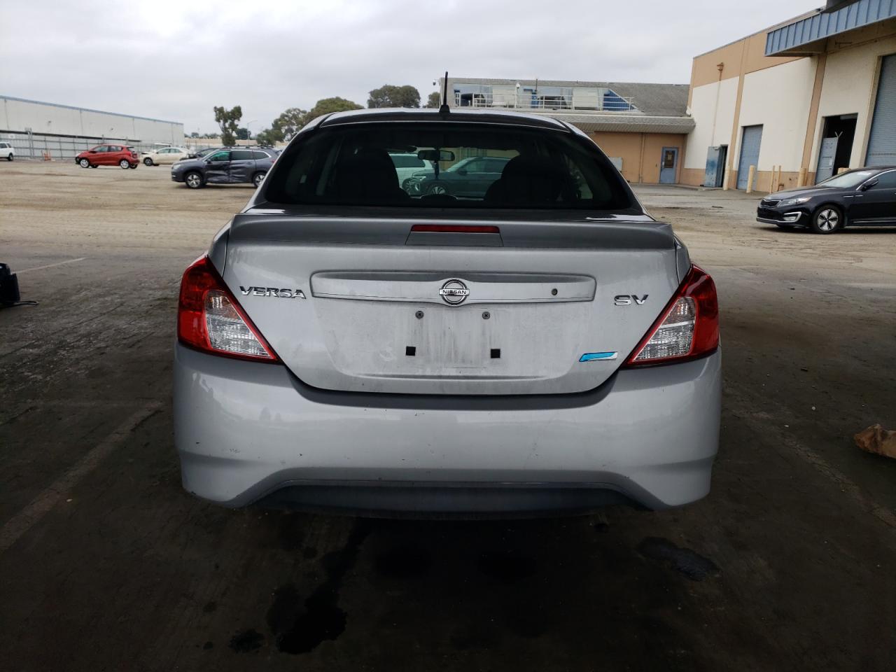 2015 Nissan Versa S VIN: 3N1CN7APXFL869058 Lot: 82336565