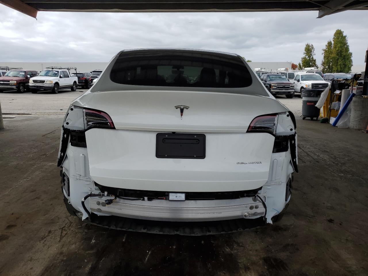 2023 Tesla Model Y VIN: 7SAYGDEEXPF619004 Lot: 82670485