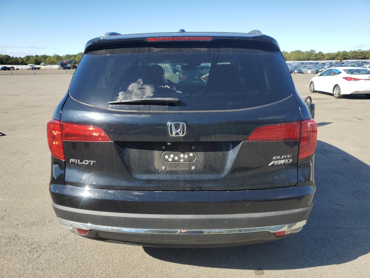 2016 Honda Pilot Elite VIN: 5FNYF6H03GB023891 Lot: 82257825