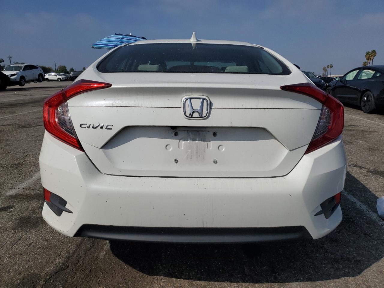 2018 Honda Civic Ex VIN: 19XFC2F77JE207107 Lot: 82308215