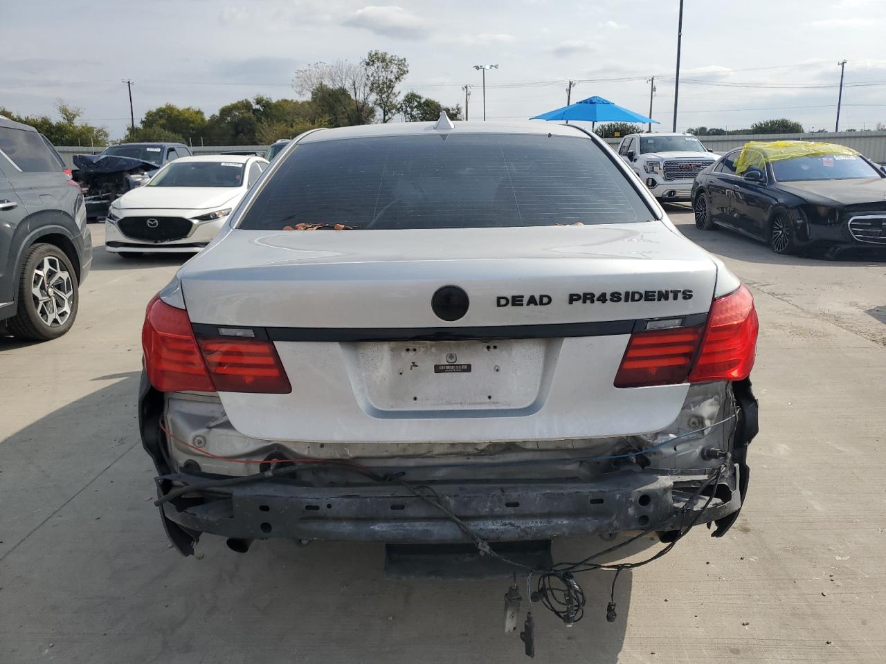 2014 BMW 740 Li VIN: WBAYE4C57ED137985 Lot: 89680015