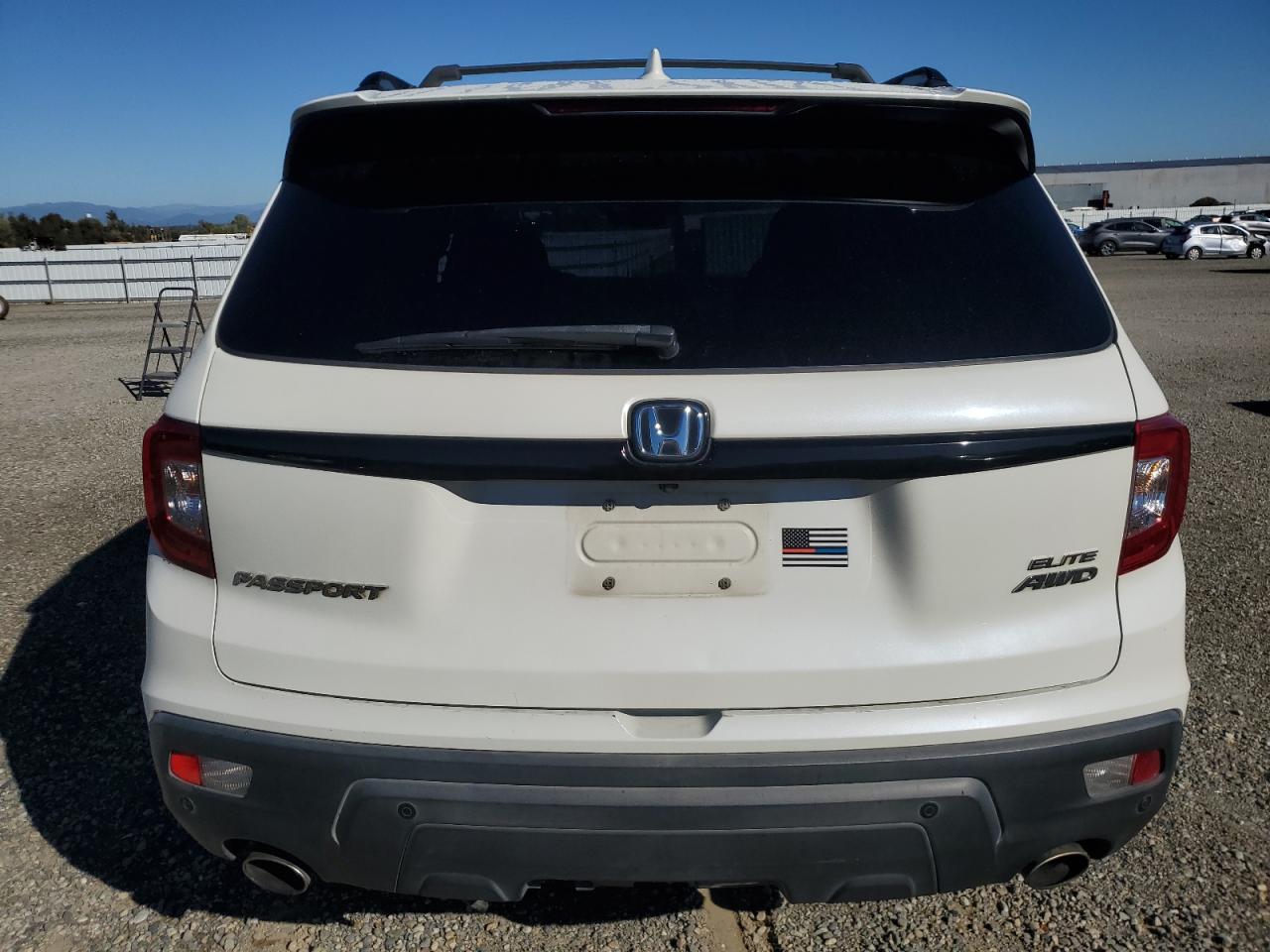 2019 Honda Passport Elite VIN: 5FNYF8H03KB003077 Lot: 87034305