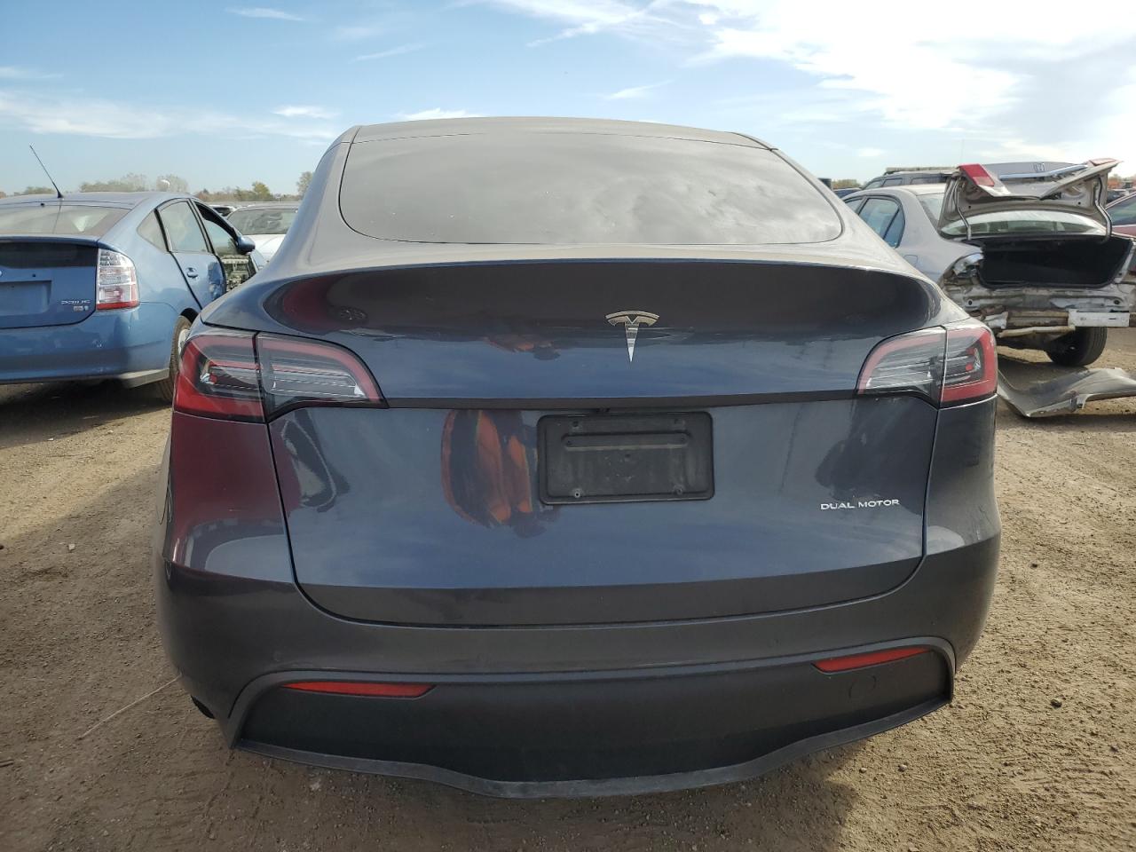 2022 Tesla Model Y VIN: 7SAYGAEE9NF328425 Lot: 87130215