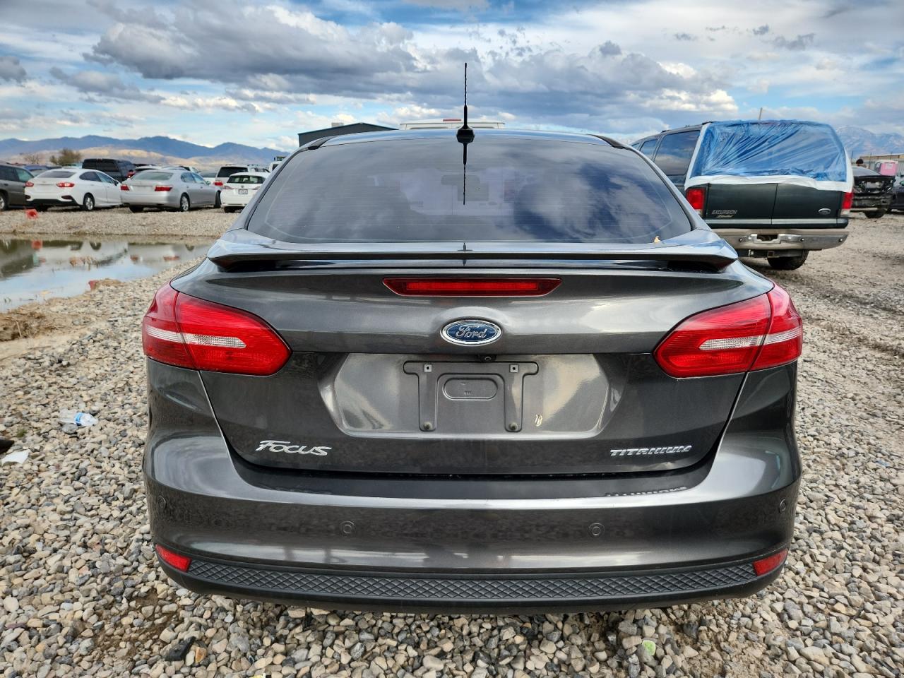 2017 Ford Focus Titanium VIN: 1FADP3J25HL265284 Lot: 86190865