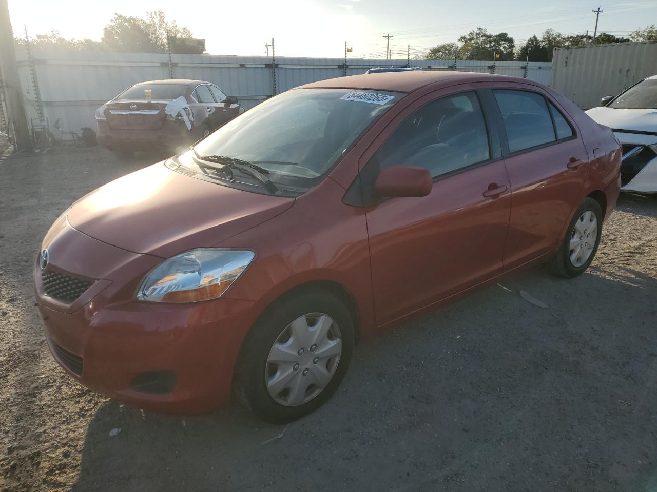 TOYOTA YARIS 2009. Lot# 84480265. VIN JTDBT903091315564. Photo 1