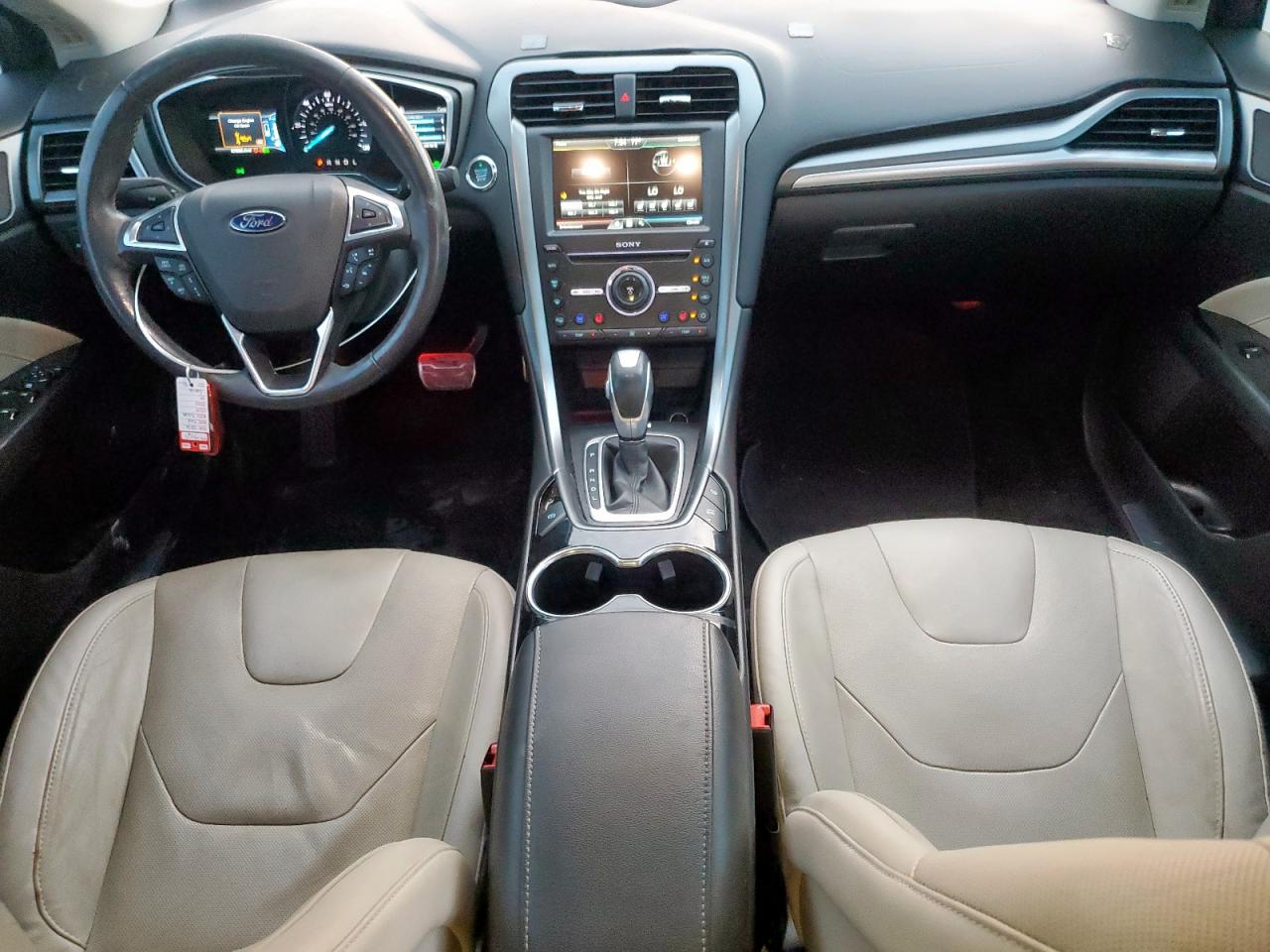 2016 Ford Fusion Titanium Hev VIN: 3FA6P0RU0GR191253 Lot: 85495815