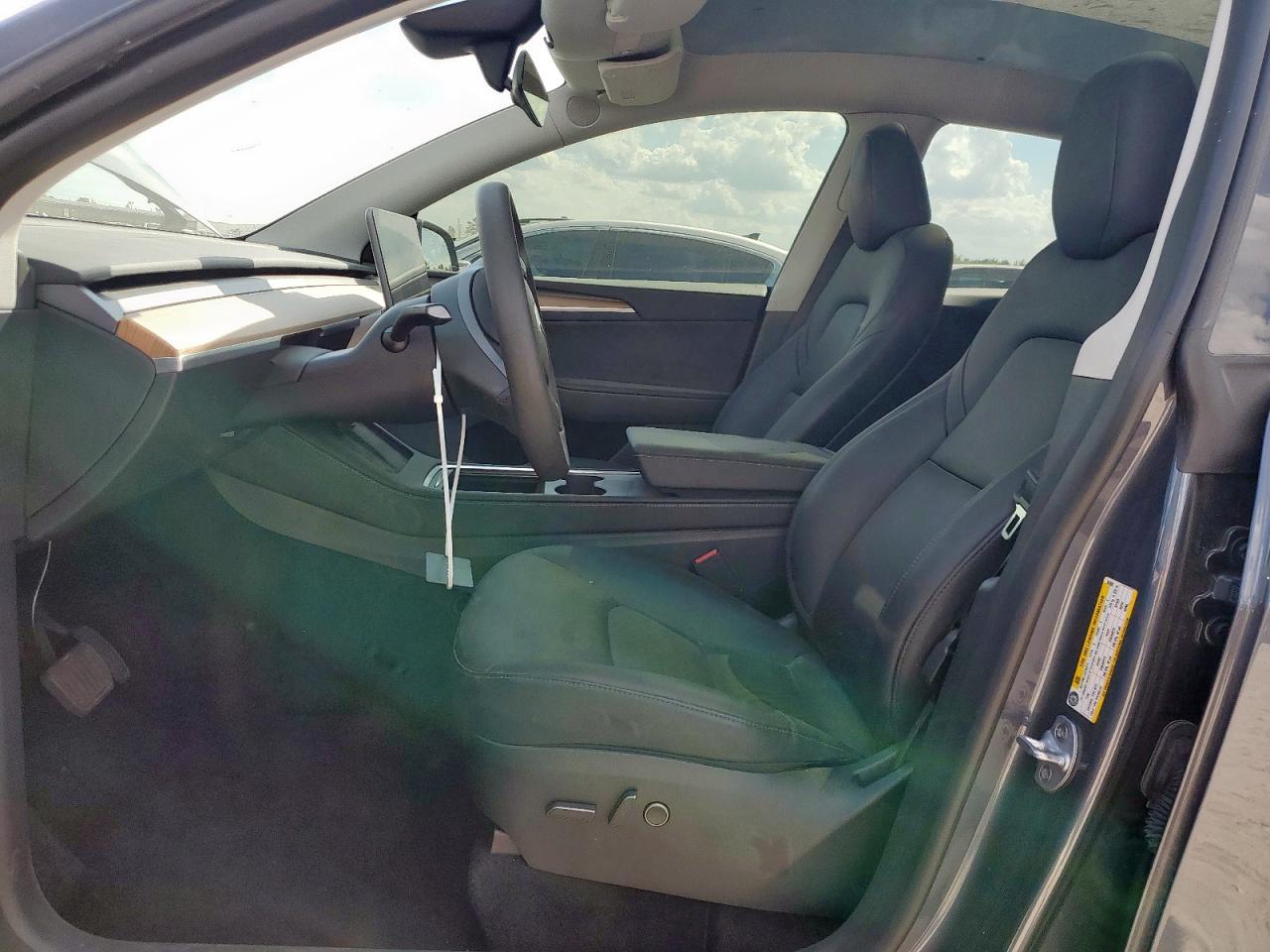 2023 Tesla Model Y VIN: 7SAYGDEE3PA187692 Lot: 82221735