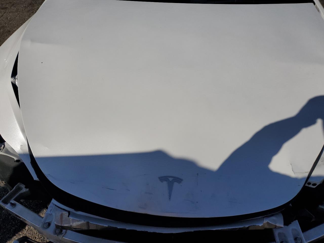 2023 Tesla Model Y VIN: 7SAYGDEE5PA121046 Lot: 89552865