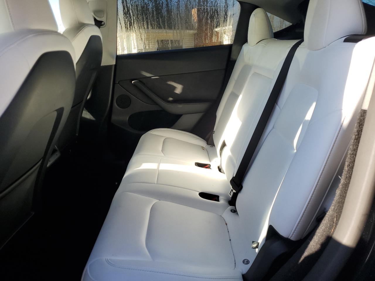 2024 Tesla Model Y VIN: 7SAYGDED2RF205158 Lot: 90543125