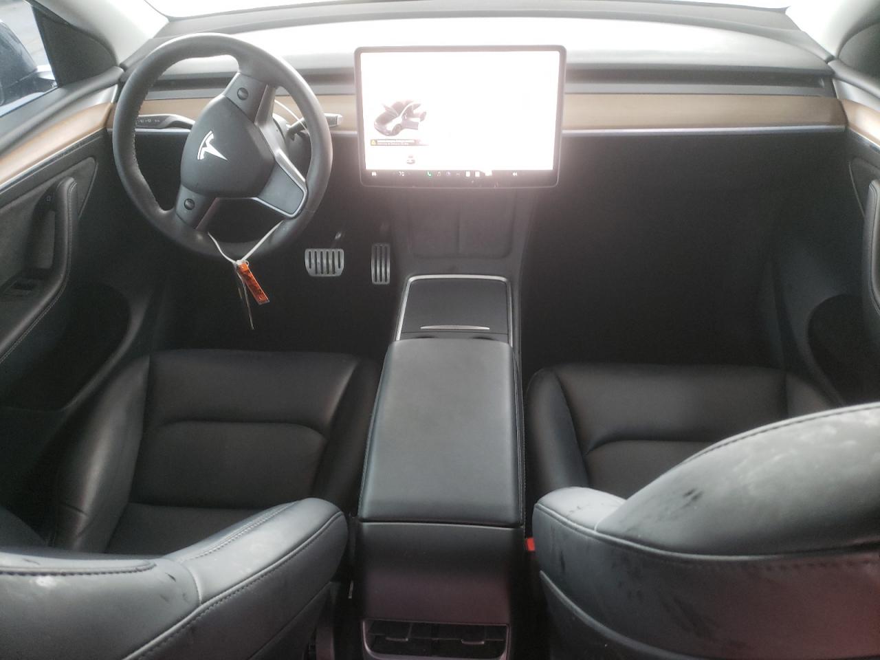 2023 Tesla Model Y VIN: 7SAYGDEFXPF644302 Lot: 84242095