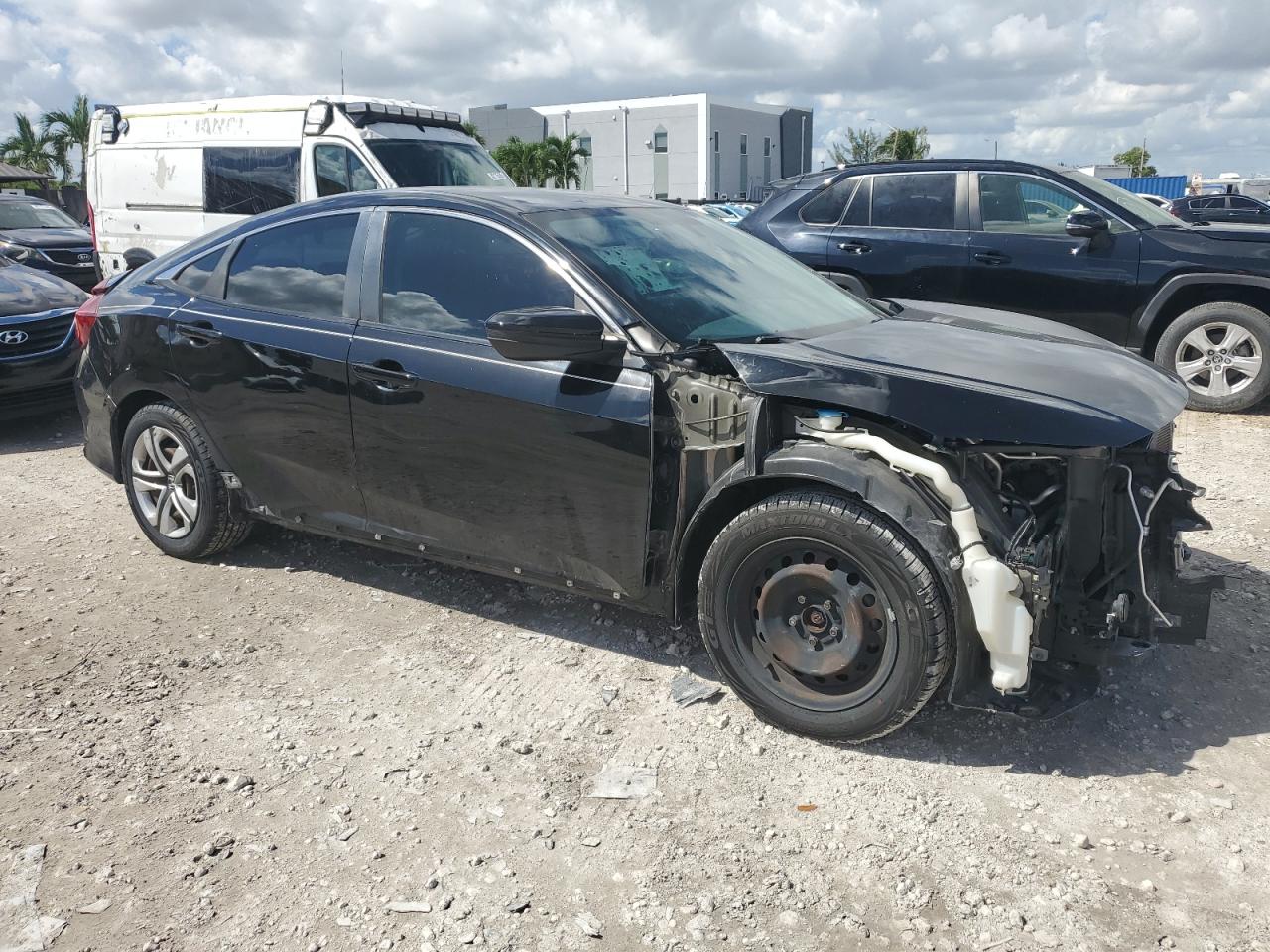 2018 Honda Civic Lx VIN: 19XFC2F50JE039003 Lot: 85145135