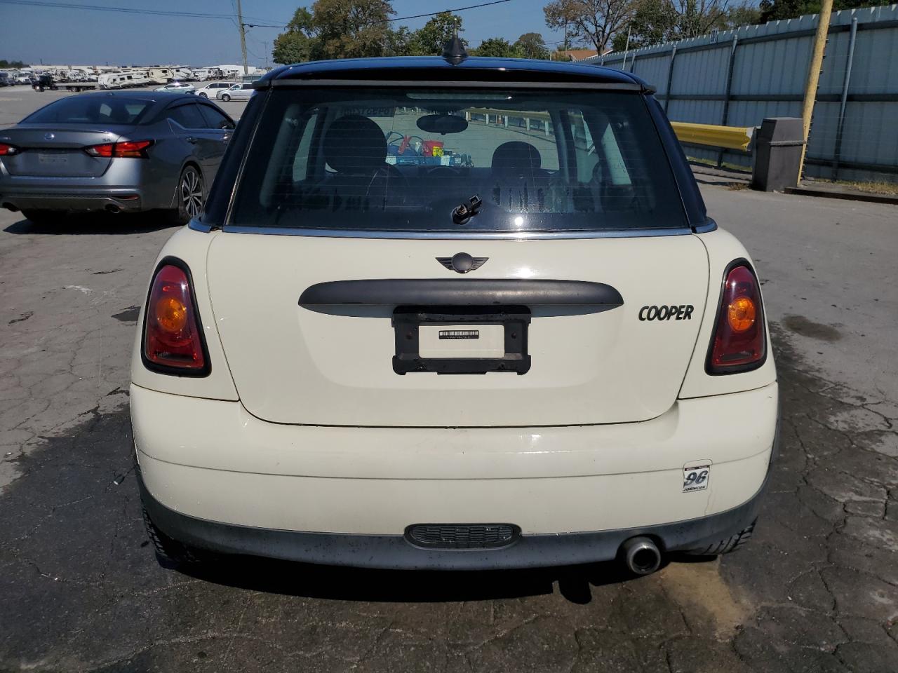 2010 Mini Cooper VIN: WMWMF3C54ATU77861 Lot: 84931205