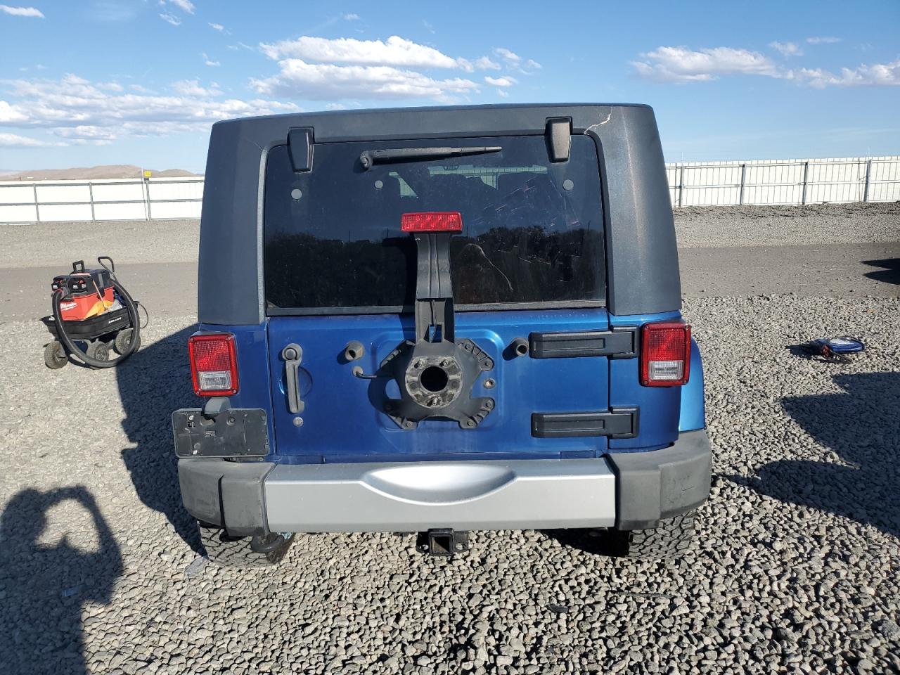 2009 Jeep Wrangler Unlimited Sahara VIN: 1J4GA59139L761051 Lot: 85202795