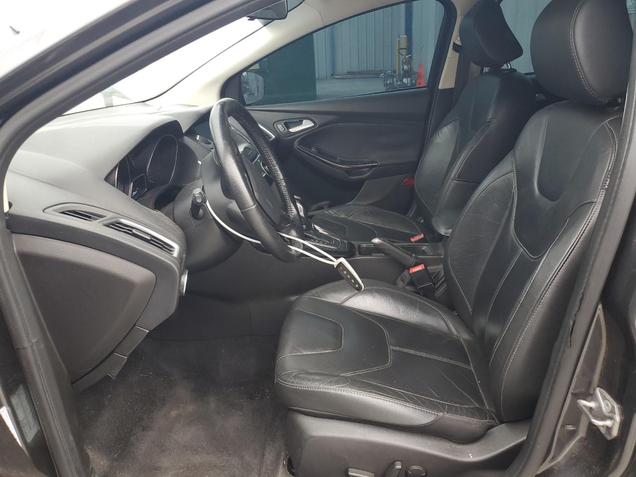 2016 Ford Focus Titanium VIN: 1FADP3N23GL383357 Lot: 82296315