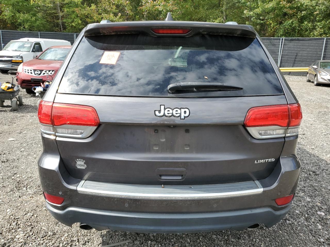 2014 Jeep Grand Cherokee Limited VIN: 1C4RJEBG9EC290627 Lot: 82279435