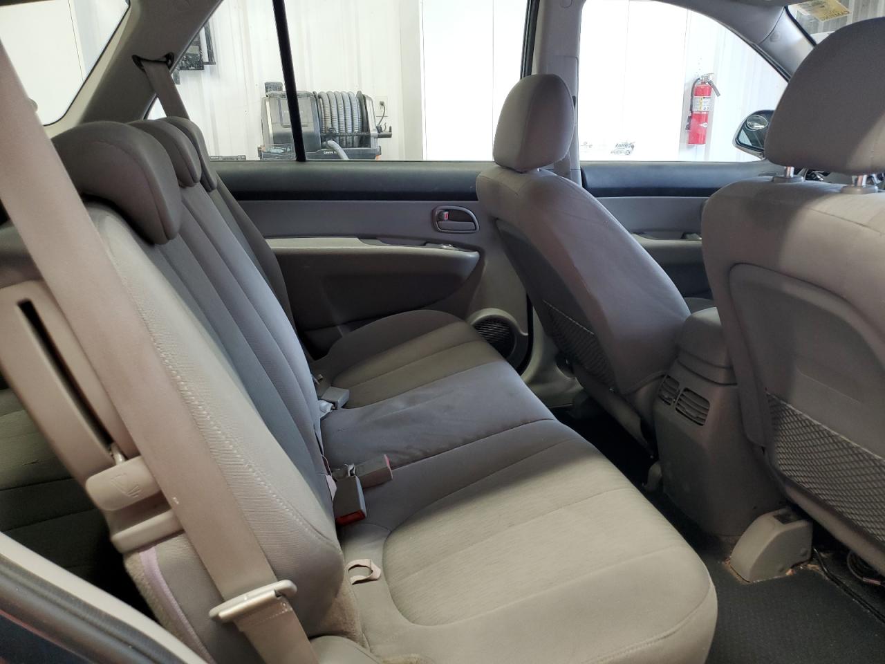 2009 Kia Rondo Base VIN: KNAFG529897279908 Lot: 90282775