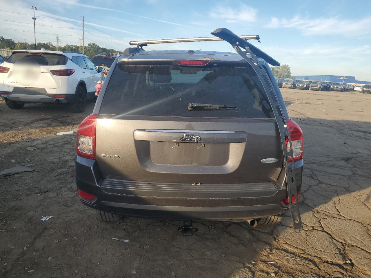 2014 Jeep Compass Latitude VIN: 1C4NJDEB6ED910661 Lot: 82192995