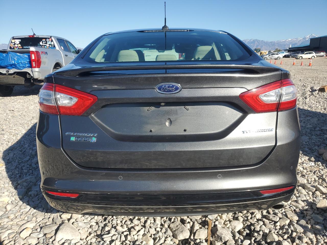 2016 Ford Fusion Titanium Phev VIN: 3FA6P0SU5GR315902 Lot: 86475265