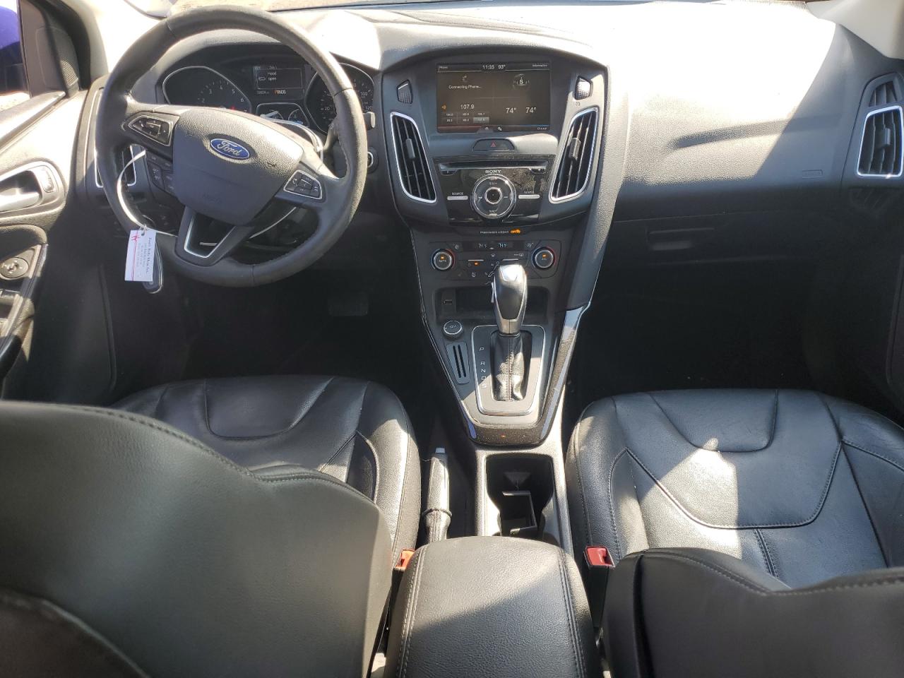 2015 Ford Focus Titanium VIN: 1FADP3J21FL363273 Lot: 85180025