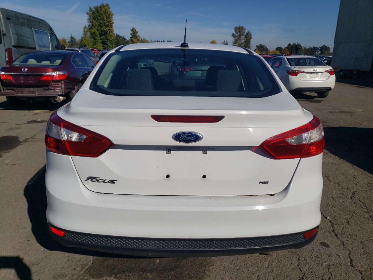 2014 Ford Focus Se VIN: 1FADP3F25EL408108 Lot: 87480305