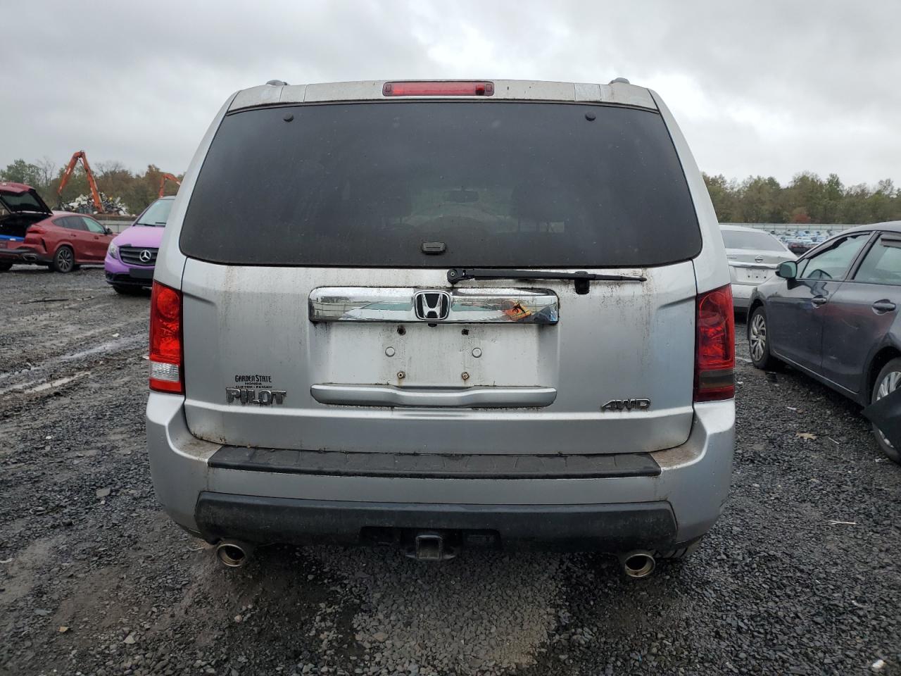 2011 Honda Pilot Exln VIN: 5FNYF4H77BB063336 Lot: 85936115