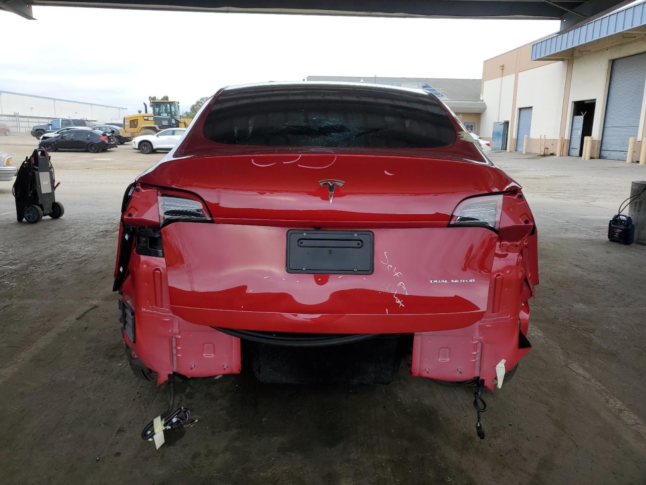 2023 Tesla Model Y VIN: 7SAYGDEE9PF715299 Lot: 82559315