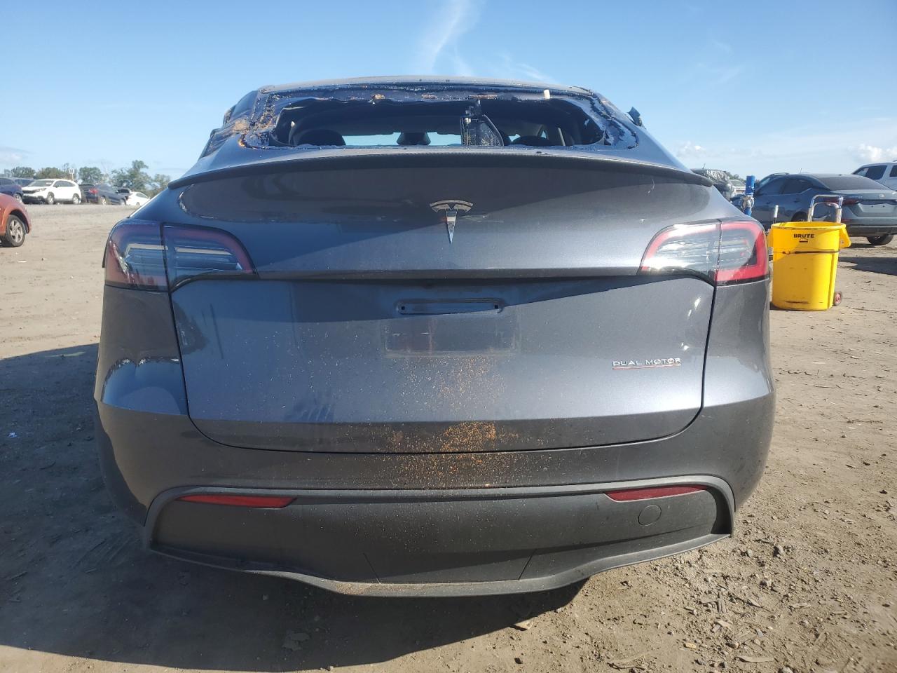 2023 Tesla Model Y VIN: 7SAYGDEF4PF894702 Lot: 84805945