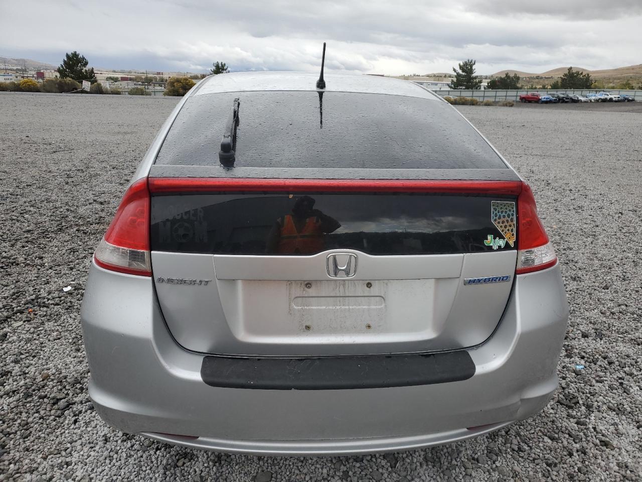 2010 Honda Insight Ex VIN: JHMZE2H77AS001933 Lot: 86451995