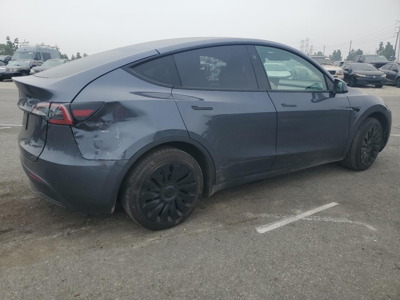 2023 Tesla Model Y VIN: 7SAYGDED7PF959203 Lot: 85182535