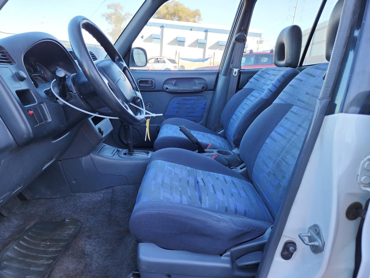 1997 Toyota Rav4 VIN: JT3HP10V5V0119707 Lot: 87101765