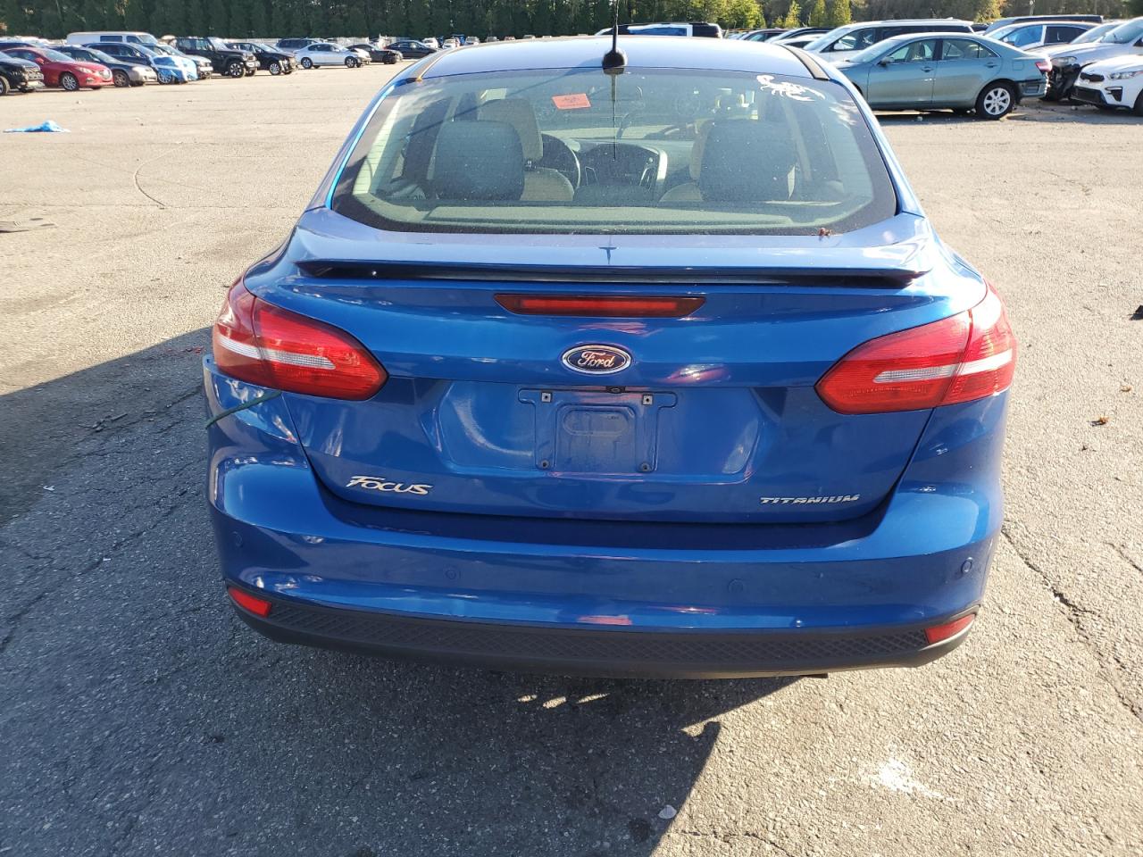 2018 Ford Focus Titanium VIN: 1FADP3J2XJL293829 Lot: 83838825