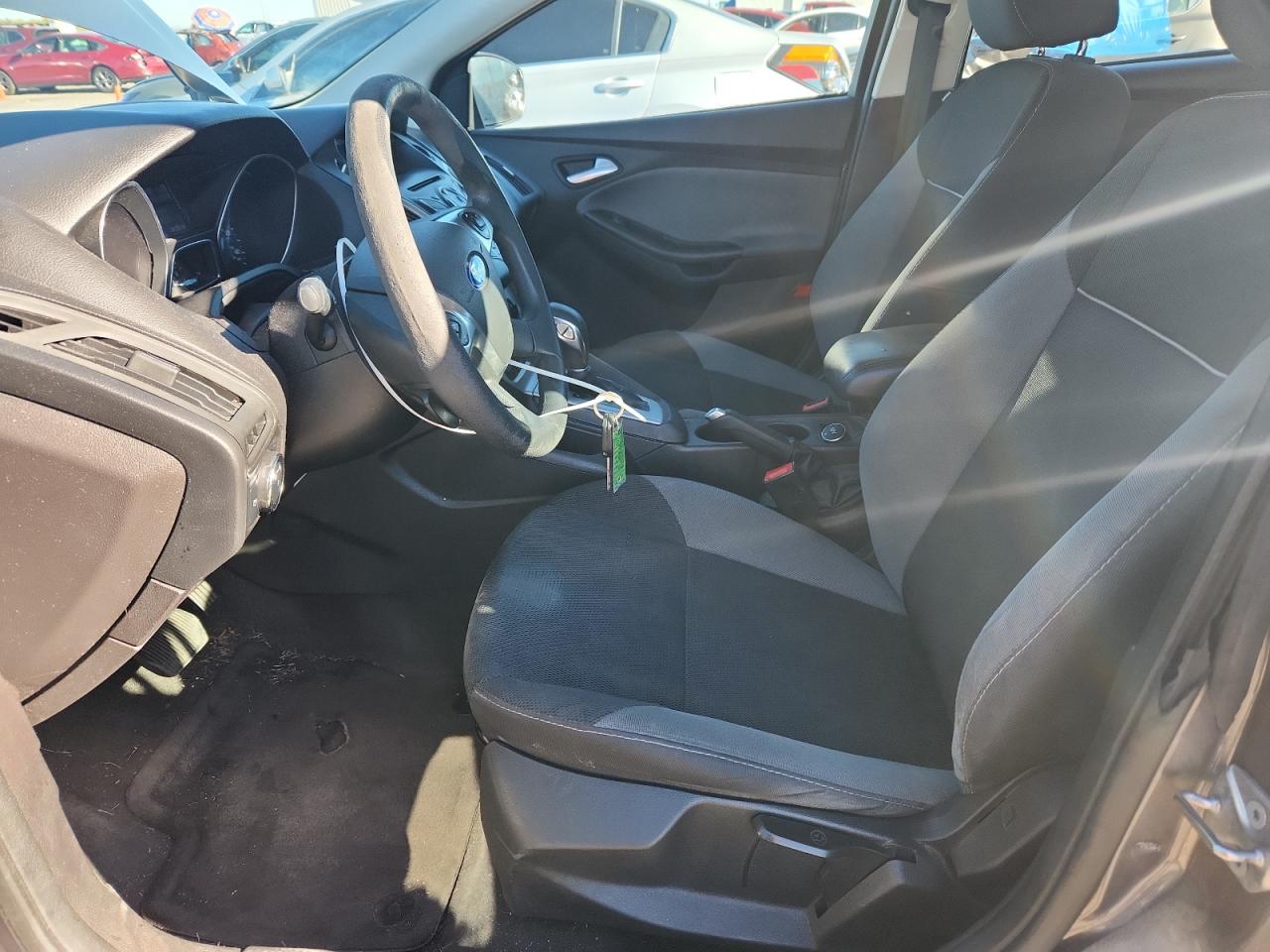 2014 Ford Focus Se VIN: 1FADP3K20EL323621 Lot: 84585275