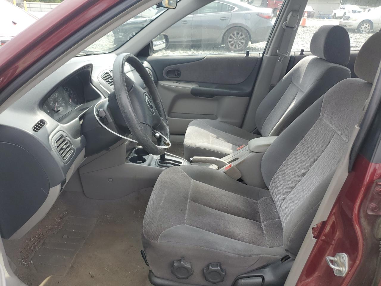 2002 Mazda Protege Dx VIN: JM1BJ225020636110 Lot: 81786975