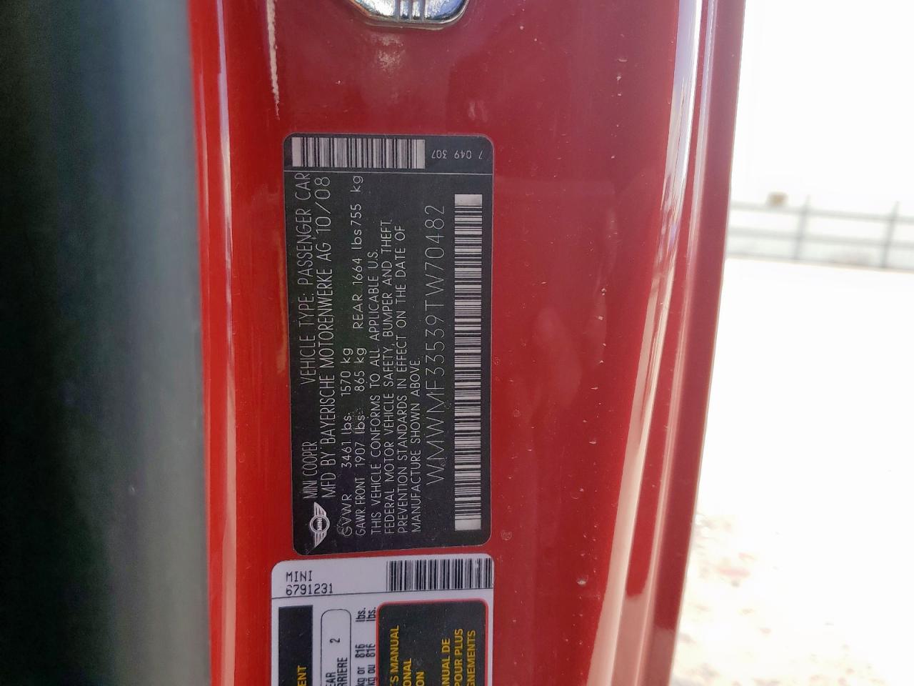 2009 Mini Cooper VIN: WMWMF33539TW70482 Lot: 86130595