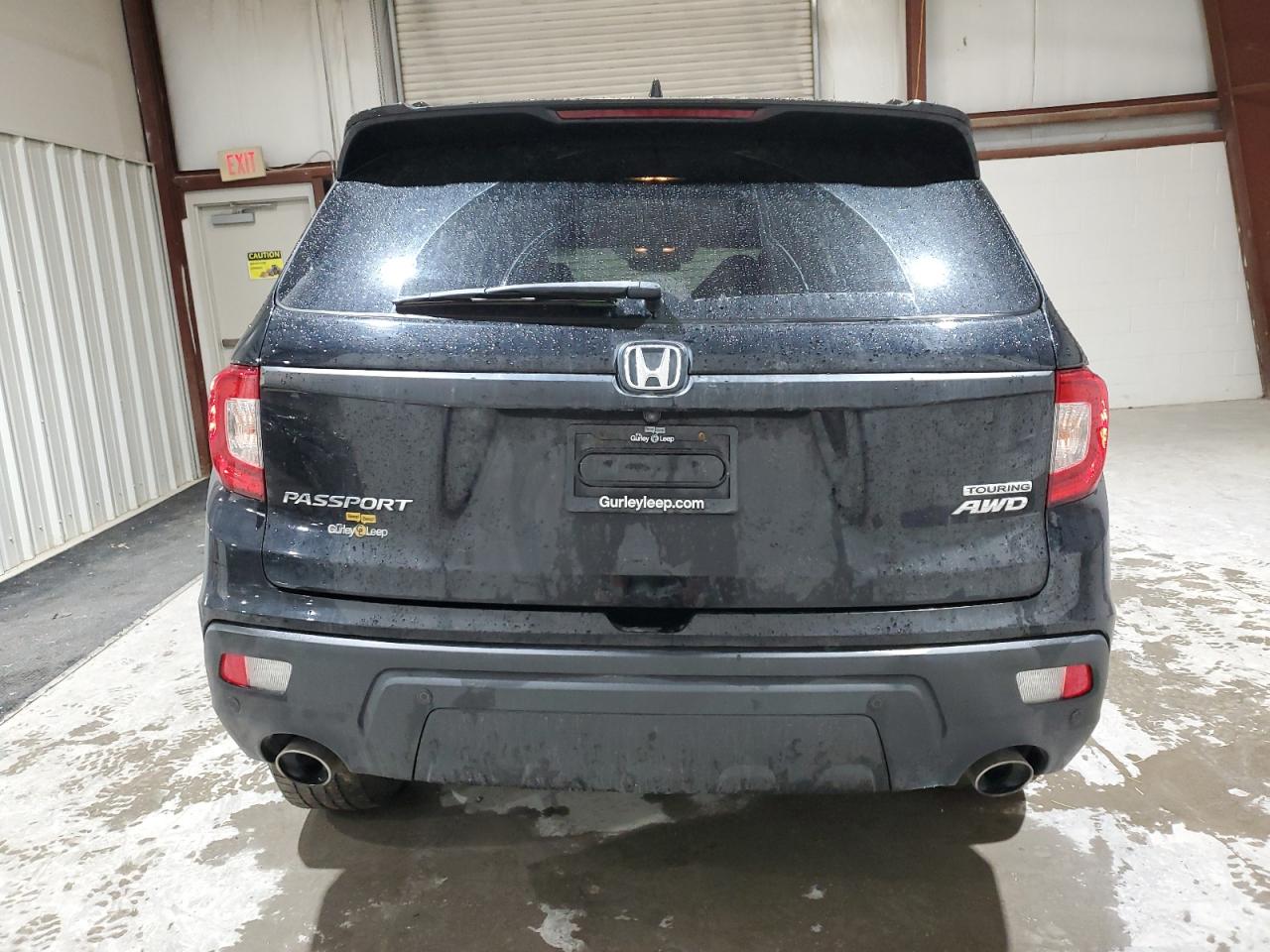 2019 Honda Passport Touring VIN: 5FNYF8H9XKB010610 Lot: 90540495