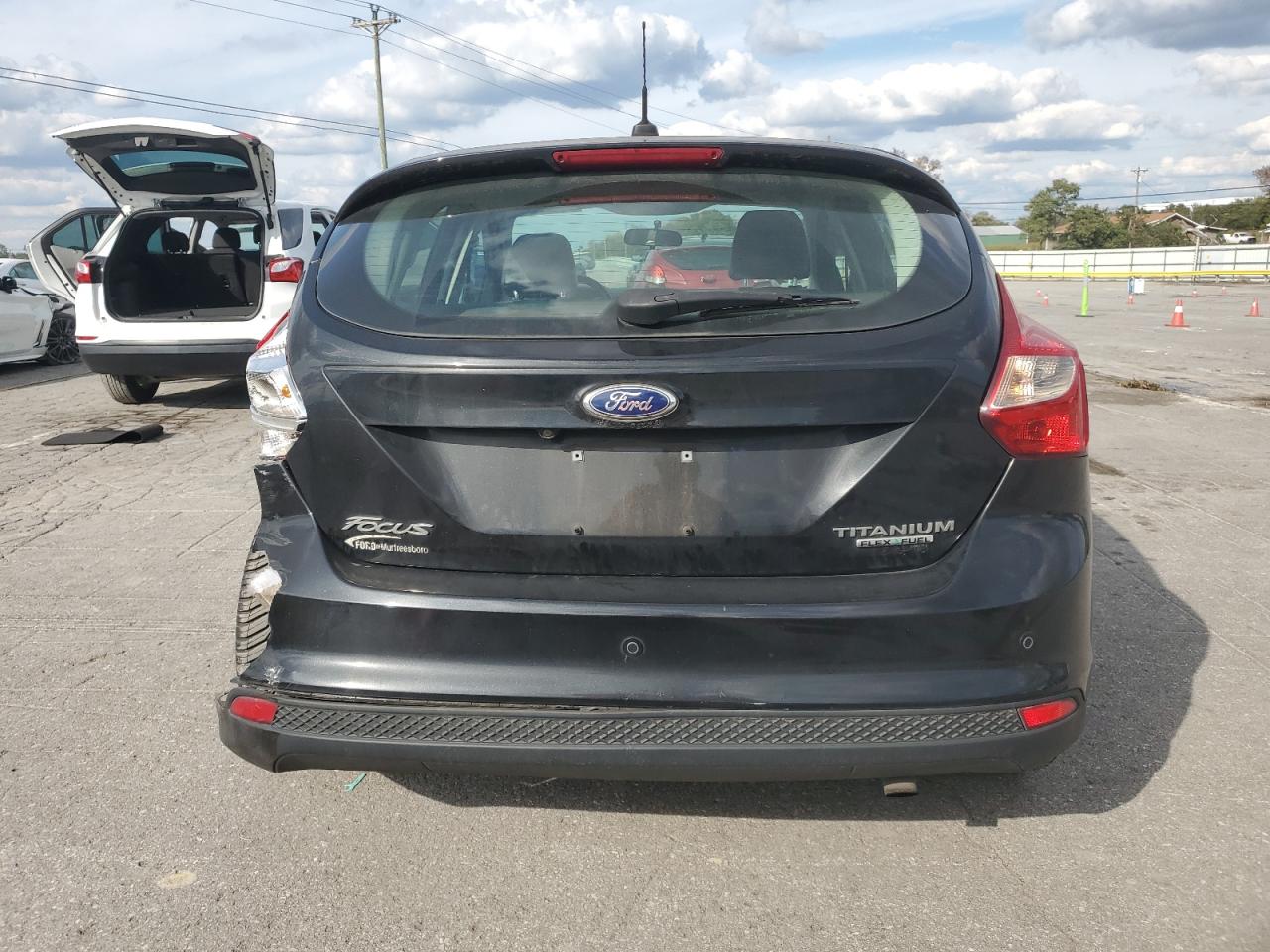 2014 Ford Focus Titanium VIN: 1FADP3N29EL357097 Lot: 86432545