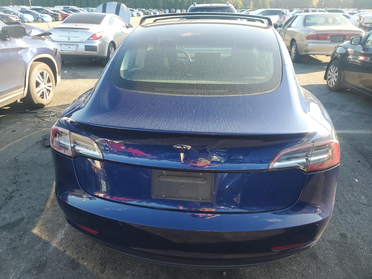 2020 Tesla Model 3 VIN: 5YJ3E1EA7LF597305 Lot: 82307105