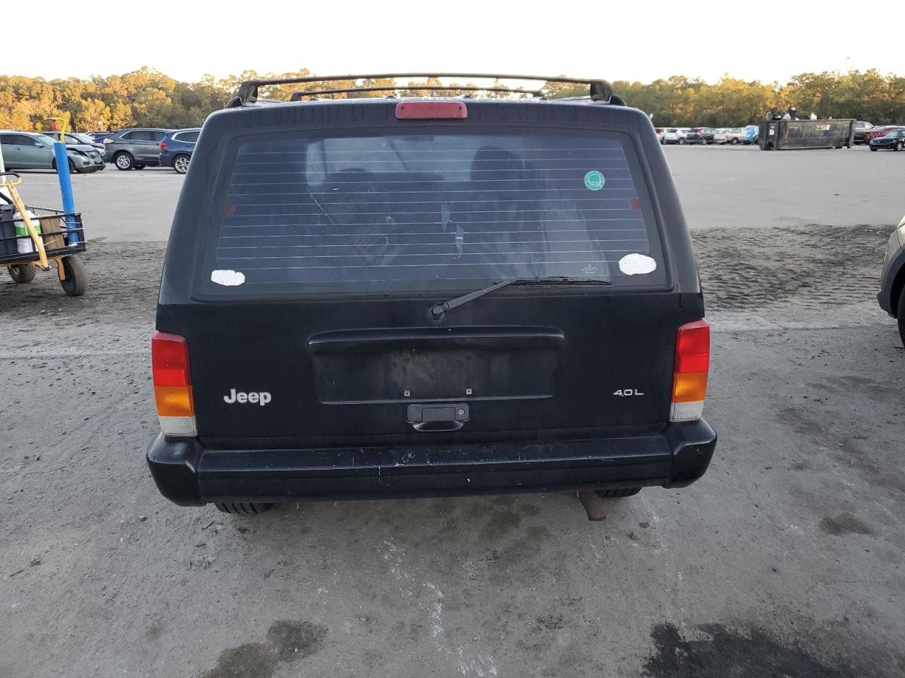 1999 Jeep Cherokee Sport VIN: 1J4FT68S2XL670579 Lot: 90354775