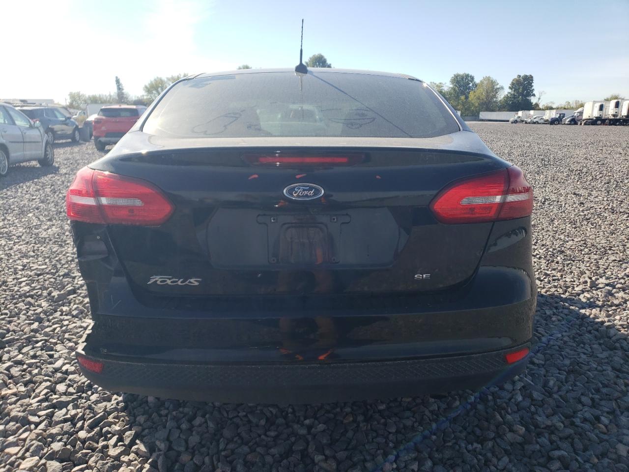 2018 Ford Focus Se VIN: 1FADP3F23JL310446 Lot: 85675775