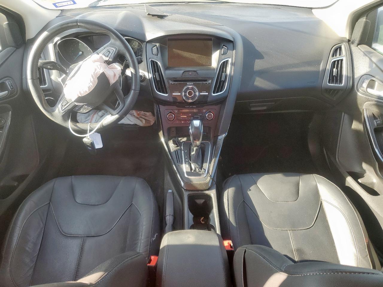 2016 Ford Focus Titanium VIN: 1FADP3N26GL318969 Lot: 86491765