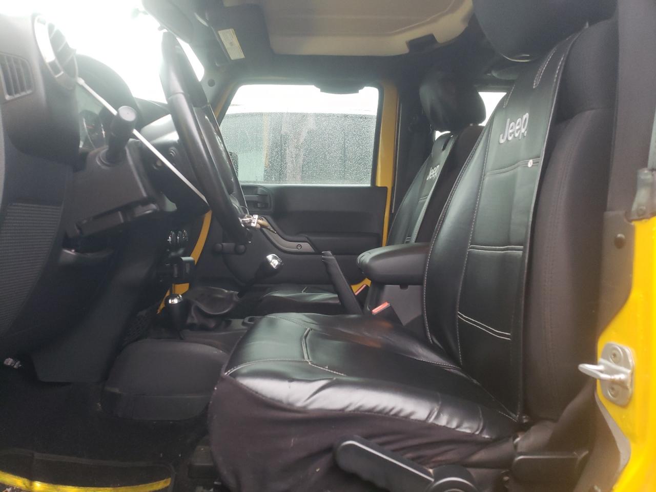 2011 Jeep Wrangler Sport VIN: 1J4AA2D1XBL521979 Lot: 86079325