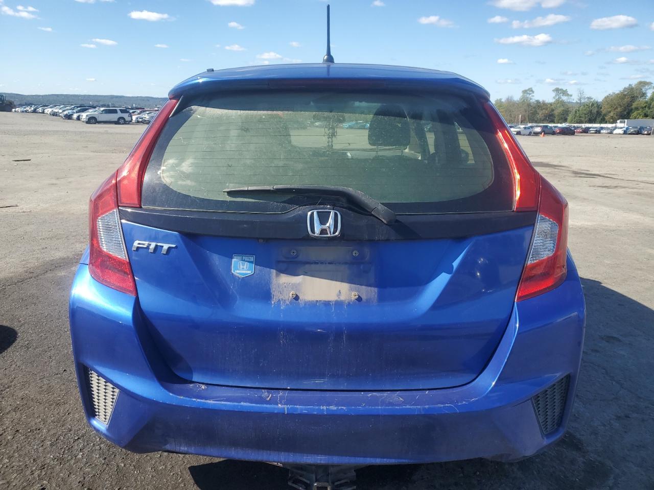 2016 Honda Fit Lx VIN: JHMGK5H58GX010247 Lot: 85537095