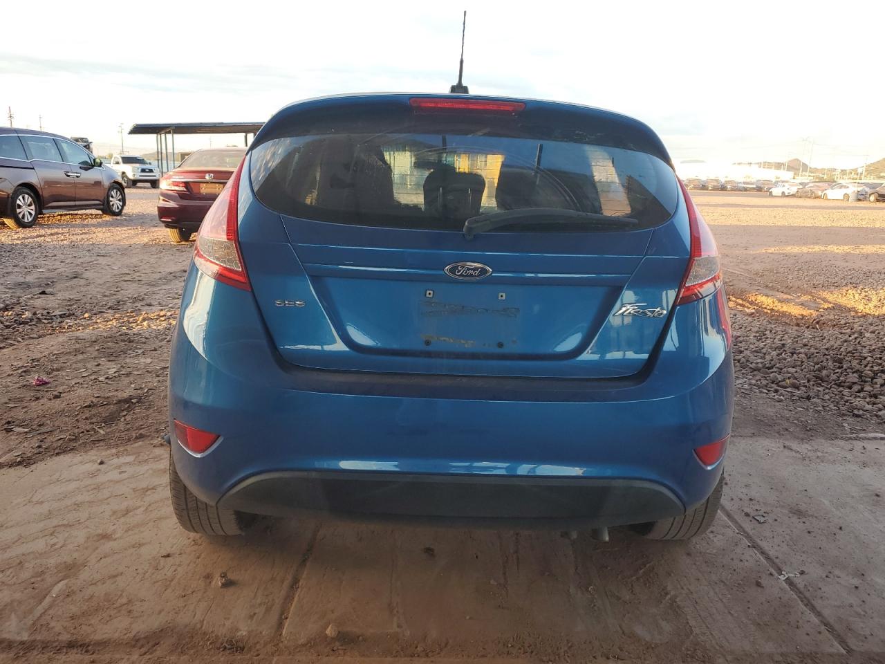 2011 Ford Fiesta Ses VIN: 3FADP4FJ2BM106699 Lot: 82597735
