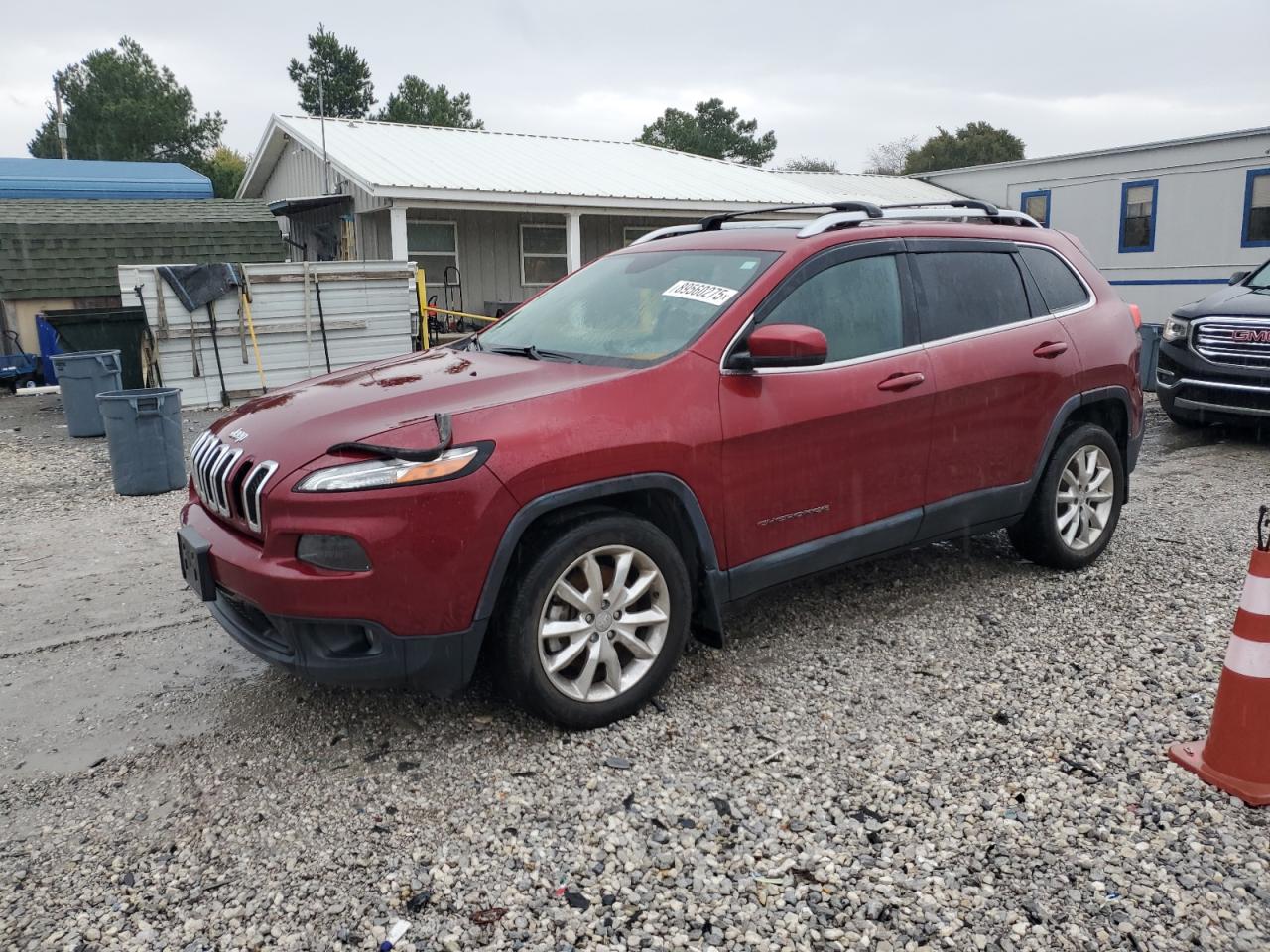 2015 Jeep Cherokee Limited red suv flexible 1C4PJLDS5FW554343 photo #1